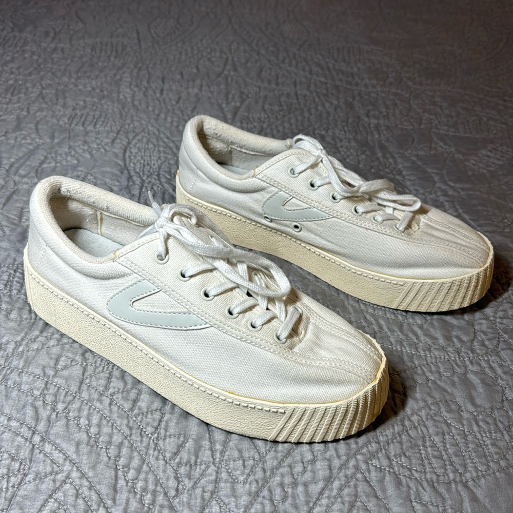 Tretorn sneakers.